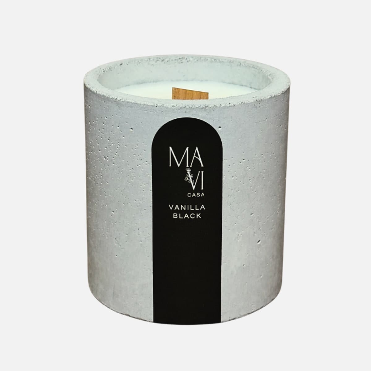 Vela vegetal Vanilla Black em pote de concreto com rótulo preto Mavi Casa